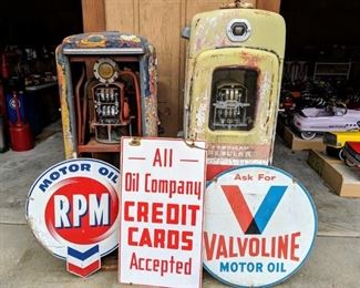 Selection of porcelain and steel signs. Selection of Tokheim, Wayne, Bennett Gas Pumps for restoration and restored condition.
