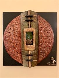 wonderful mixed media artwork (wood, stone, a nautilus shell, on slate) by Vicki Grant (www.vickigrantfinearts.com)