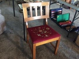 Chair with embroidered seat