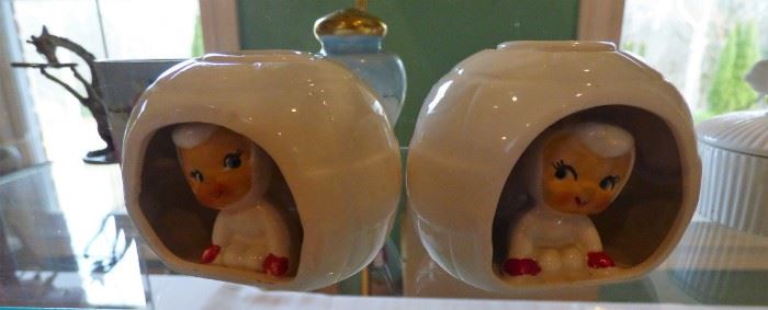 Close up of Holt Howard Snow Babies in igloo candleholders