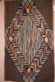 Antique hand hooked rug