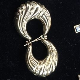14k gold loop earrings.