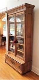 Here is a lovely Louisiana bookcase featuring locking doors and storage beneath. It's fantastic!