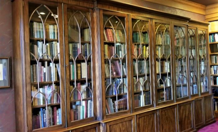 Fabulous antique bookcase - the library was built around it - dates from 1780, 15 feet long, mahogany breakfront/bookcase.  This one of a kind library, modeled after the one in the film My Fair Lady, houses thousands of volumes.  Hundreds are rare and/or out of print.
