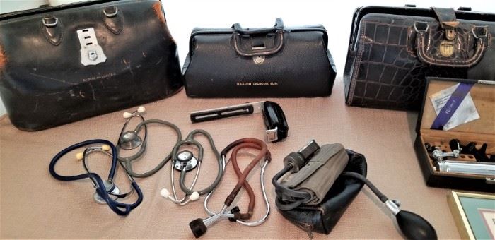 Selection of vintage doctor bags and equipment....