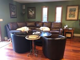Leather sectional sofa, barrel chairs, occasional tables & art