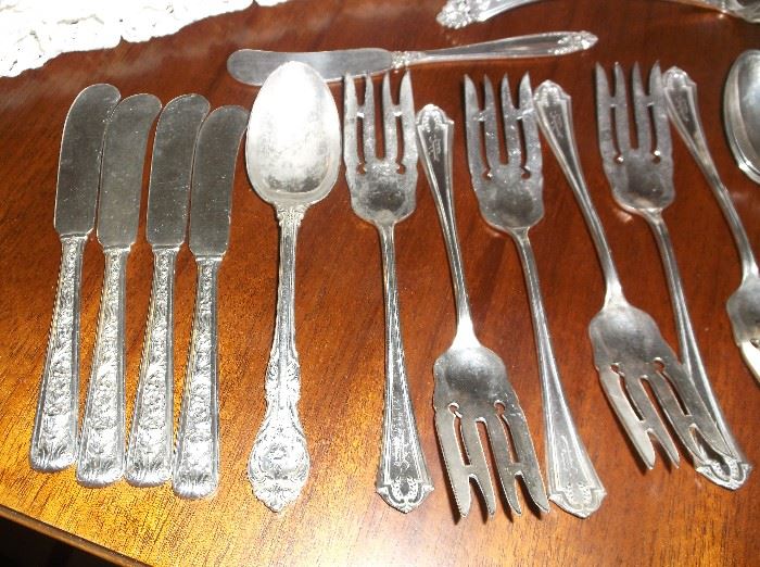 "Windsor Rose" butter spreaders, "King Edward" spoon, " Quincy" dessert forks