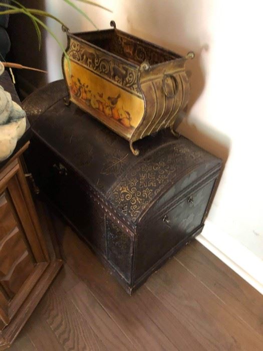 Several decorative metal trunks boxes