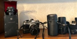 Canon AE-1 film camera with winder, many lenses