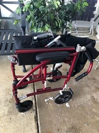 Fold up wheel chair - very nice one.