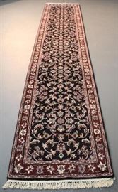 Attractive Kashan design runner, 100% wool and high quality, hand knotted runner. The dark center color and the red surround will set any hallway into a fashion show runway