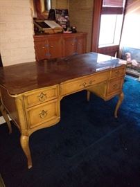 French style desk with cabriolet legs.