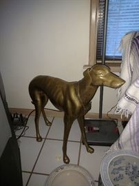 Large Hollywood Regency Brass Dog with open/close sign around neck.