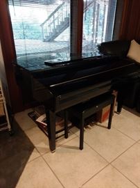 Yamaha digital piano owned by professional pianist. Two one a baby grand.