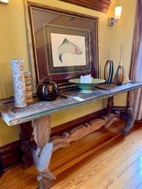 This amazing console table was created by an Austin artist.  The top is made from an old church door. 