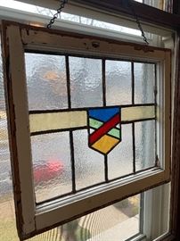 Assortment of vintage stained glass.