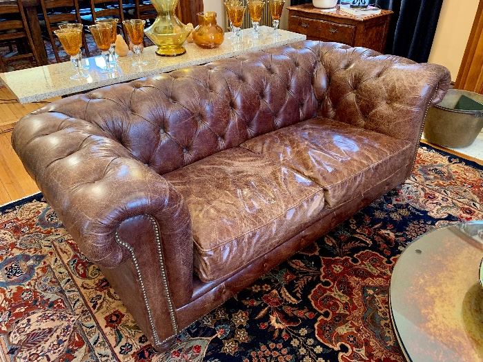 Vintage tufted leather sofa...measures 76"W x 38"D x 30"H.   Rug measures12'10"x9'