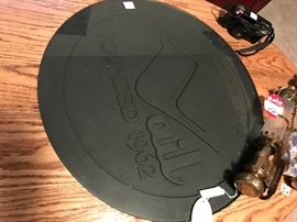 Custom made Oak, Vail Colorado coffee table with 1962 manhole cover inset. Vails Inaugural year.