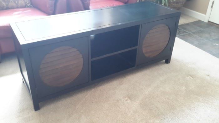 Unique black painted wood TV stand with lots of storage.