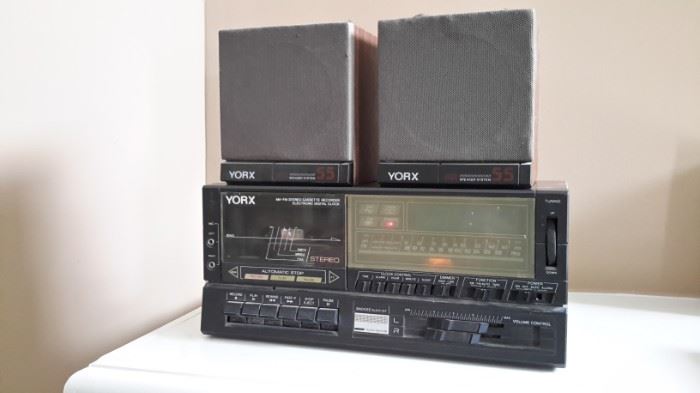 Vintage YORK AM-FM stereo cassette recorder. Stereo and cassette work. Digital display and one speaker need work.