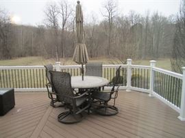 PATIO TABLE AND 4 CHAIRS AND UMBRELLA