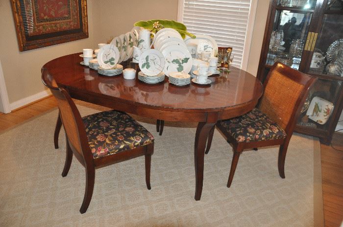 Spectacular Baker Old World Mahogany 54” round dining table with 4 Sloan mahogany and cane side chairs from the Milling Road Collection. Table includes two 22” fillers 
