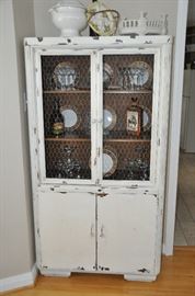 Wonderful vintage shabby chic cupboard with three interior shelves and a two door bottom storage.  37”w x 66”h x 15”d
