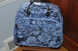 Great Baggallini rolling carry on. 