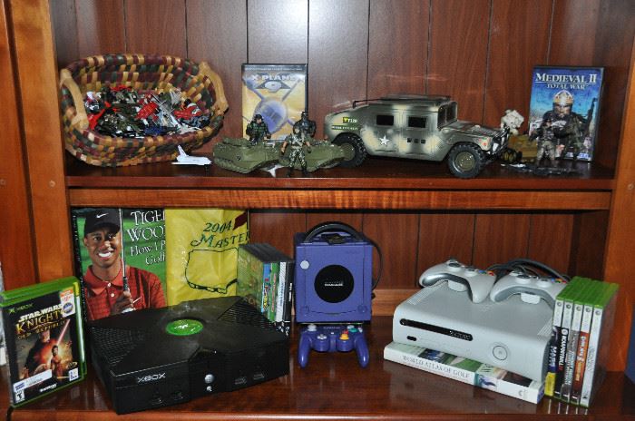 2005 X Box video game system available with games, another GameCube with games as well as an Xbox 360 System with two remotes and 5 games available