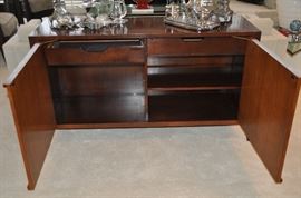Interior includes two drawers including one lined for flatware