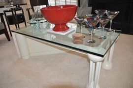 Custom made contemporary geometric ivory lacquer coffee/cocktail table with 3/4" glass top, 51"w x 18"h x 29"d shown with a large Italian centerpiece bowl, stained glass martini glasses and a pedestal glass cold server! 