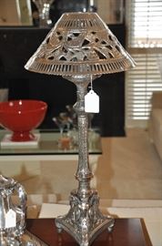 One of the two reticulated and etched silver-plate 24" candlestick lamps, made in India