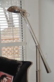 Great polished chrome adjustable 60" floor lamp by Intertek