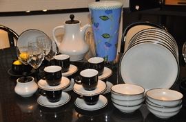 Vintage 5-pc. place setting, Noritake Japan Stoneware “Folkstone”. Service for 8 includes coffee pot, sugar, gravy and butter dish. Also shown is a 12” vase by Droll Designs, retired. 