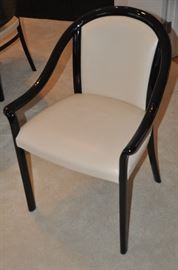 One of the two Stendig arm Dining Chairs 