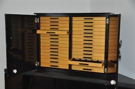 View of the spectacular 30 velvet lined drawers with lacquer contemporary pulls