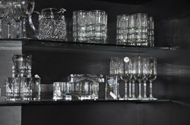 Bar includes a Waterford crystal pitcher, a vintage Peter Allen Designs Lucite ice bucket and more stemware