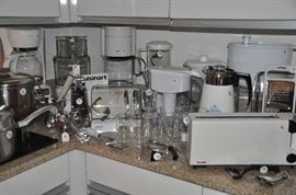 Amazing collection of coffee makers, Maxim toaster, Cuisinart with disc holder, new Britta water pitchers, vintage blue flower Corning coffee pot on stand and more!