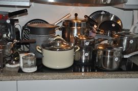 Many Calphalon, Farberware and Kirkland pots and pans available! 