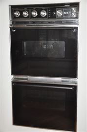 Black and stainless Tappen double ovens, 48"h x 26.5"w 