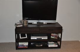 Great dark brown with black metal trim 2 drawer, 2 shelf media unit! (TV mounting bracket included), 46”w x 26”h x 22”d