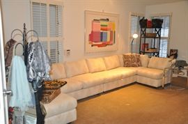 Fantastic "Women's Boutique" hosts a 5 piece sectional with loose cushion pillows by Classic Gallery