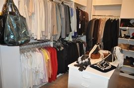 Our NOT TO MISS walk-in closet filled with fabulous women's clothing, mostly sizes 12-16