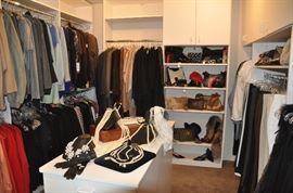 Another view of this fantastic closet offering  dozens of sweaters, many cashmere as well as 2 piece suits and sets!