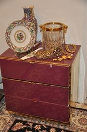 Another matching nightstand/side table shown with more gold filled jewelry, a vintage Imari vase, another vintage ice bucket and a Sevres cake plate with server