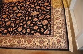 Machine made 6’ x 9 “ area rug 