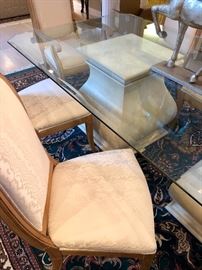 Glass Top Table features two large ivory bases - 