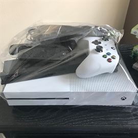 Xbox with accessories.