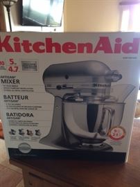 Kitchen Aid stand mixer never opened. New in Box!