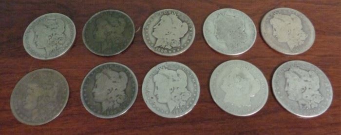 Several Morgan silver dollars